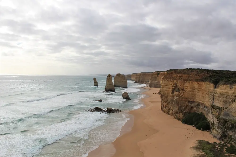 Plan your road trip with this useful Adelaide to Melbourne drive itinerary via the Great Ocean Road. Includes highlights in Victoria and South Australia such as the Twelve Apostles, The Otways and Mount Gambier, driving times and distances, petrol and accommodation costs and recommended campsites.