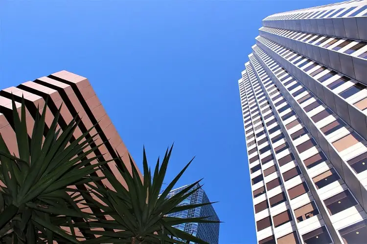 Cool view looking up at skyscrapers in Perth in a blog post about living in Perth, Australia.