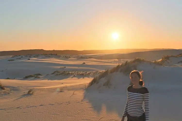 Visit Yeagarup Sand Dunes near Pemberton, Western Australia. Find out how to visit these stunning dunes in D'Entrecasteaux National Park WA by foot or 4WD, where to camp, and see amazing sunset pictures.