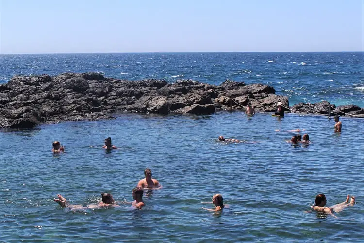 Swimmers at Kiama rock pool.