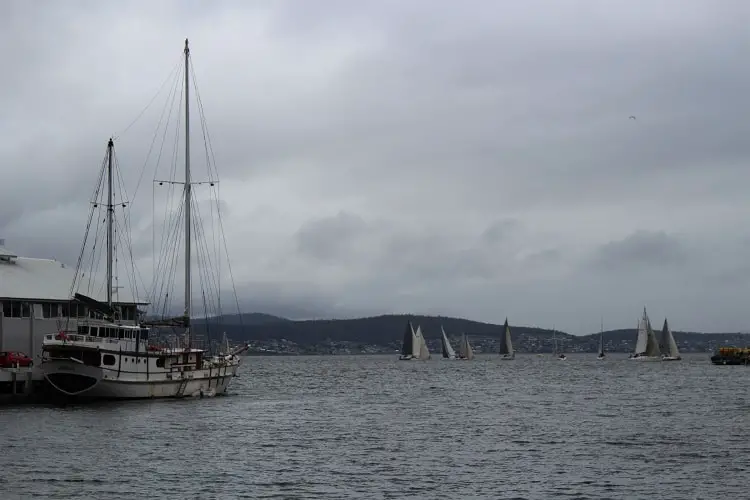 Hobart climate showcased in a cloudy, harbour shot.