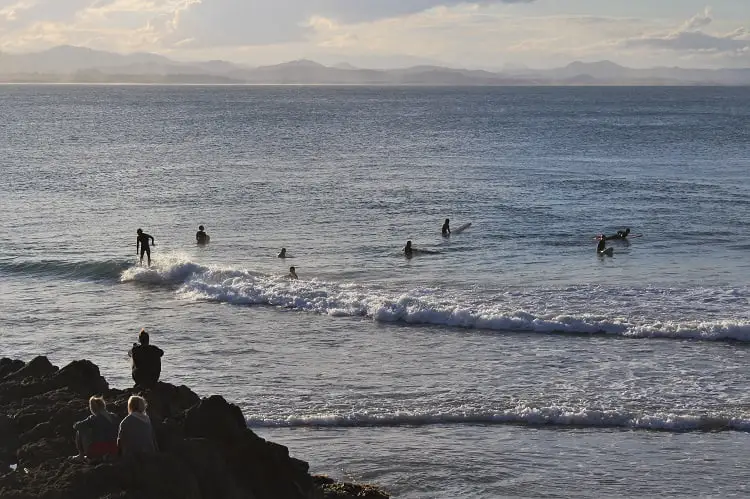 Watching surfers - one of many things to do in Byron Bay.