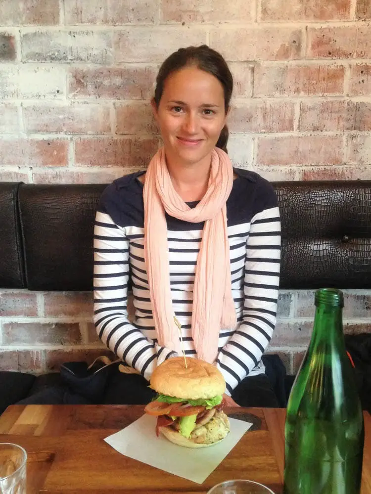 Blogger, Lisa Bull, with a large burger at The Burger Haus, Hobart.