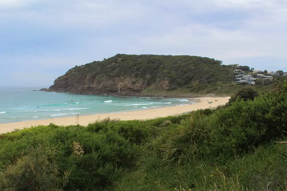 Beautiful Boomerang Beach NSW and the northern headland on a cloudy but bright spring day.