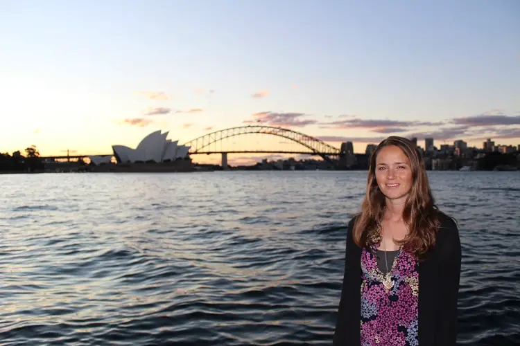 Travel blogger, Lisa Bull, at Sydney Harbour at sunset.