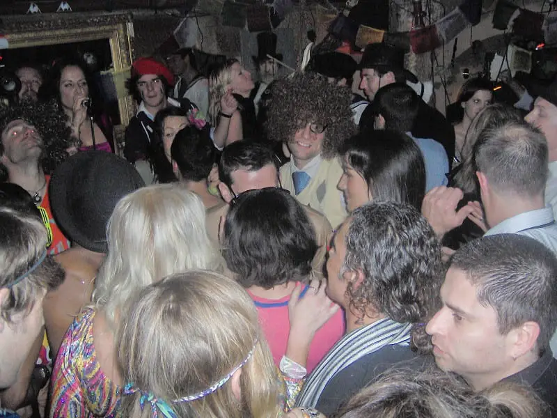 Partygoers in fancy dress dancing at a nightclub in Kings Cross, Sydney.