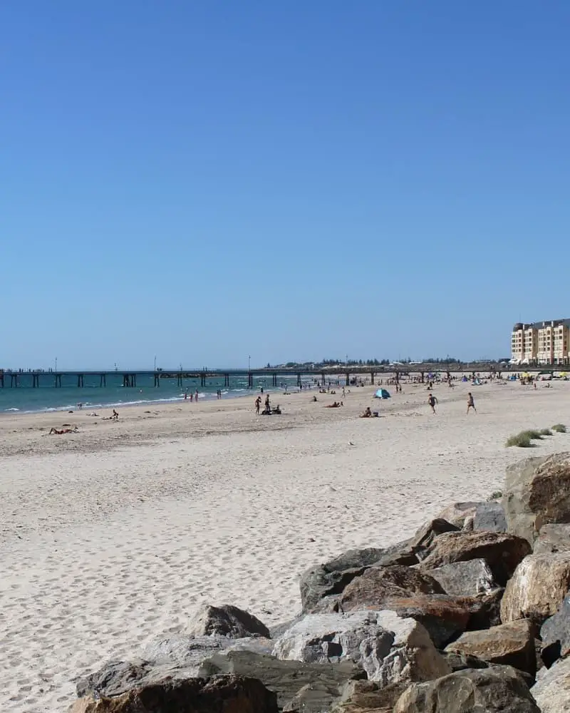 A sunny day at Glenelg Beach in Adelaide.