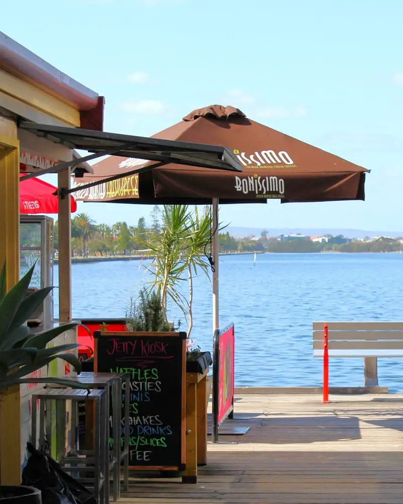 A cafe overlooking the Swan River showing the typical outdoor lifestyle in Perth, Australia. Learn more about Perth vs Adelaide lifestyle.
