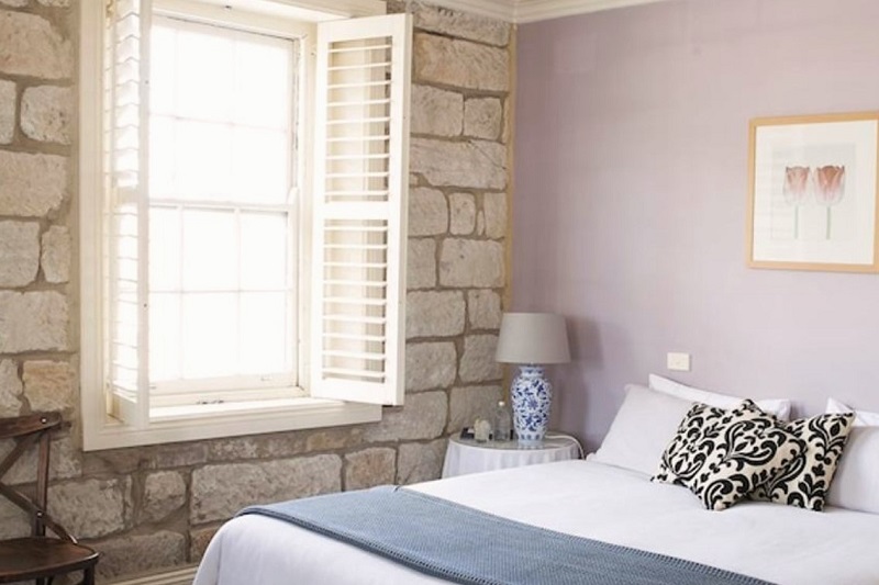 Boutique room with exposed brickwork in The Lord Nelson Brewery Hotel, Sydney.