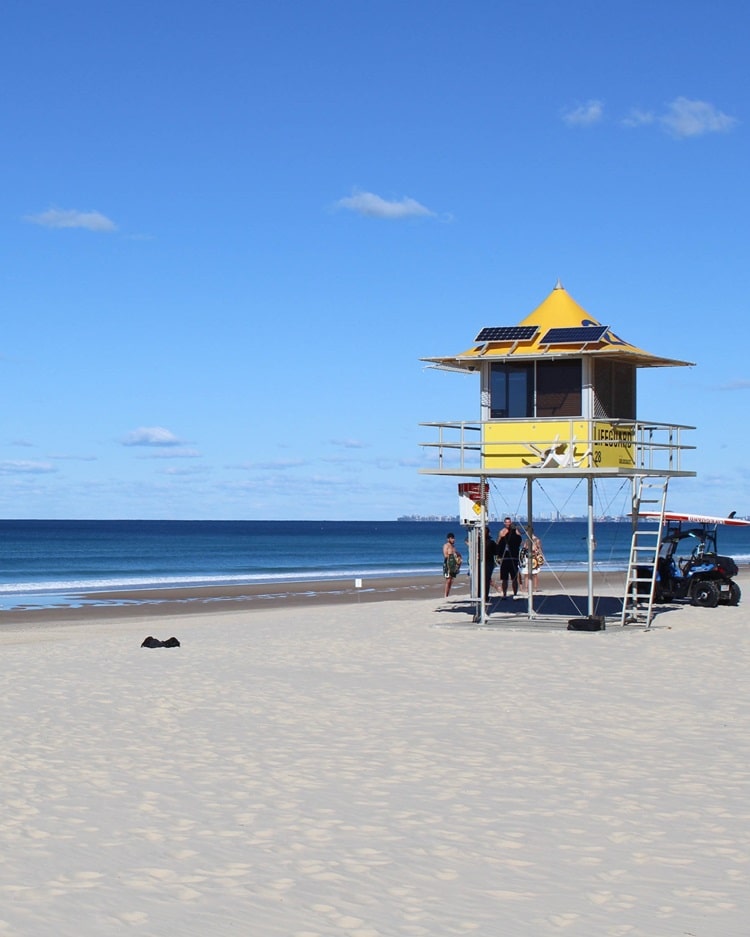 Yellow lifeguard tower at Broadbeach on the Gold Coast.